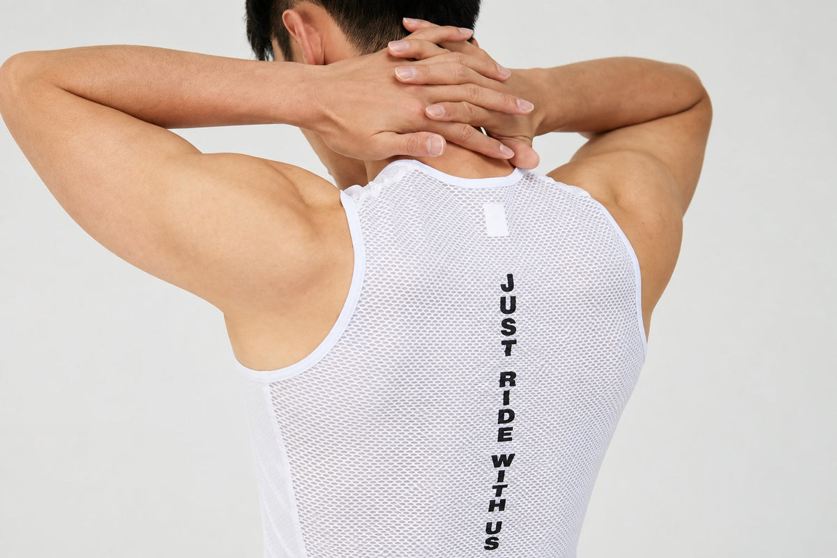 Rear view of a DEER mesh base layer showing its open fabric structure.