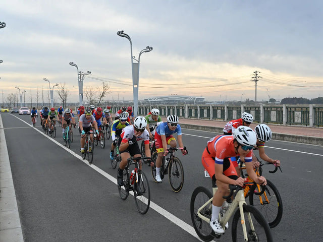 Cycling group riding together
