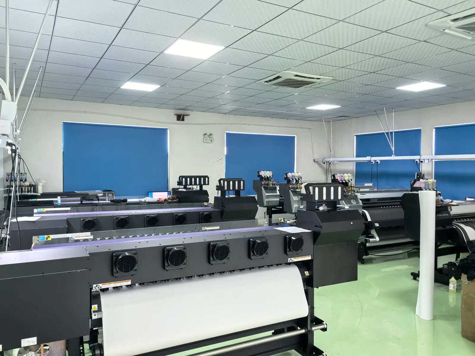 Textile print production context at a DEER production partner facility.